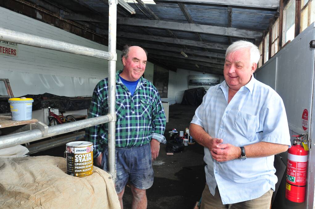 PAINT RIGHT: Orange Show Society president Peter Naylor and showground committee chair Cr Ron Gander have welcomed a fresh coat of paint on the showground’s pavilions. 
