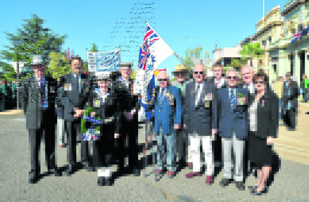 PLEASE JOIN US: Alan Ralston, David Cantwell, Mitch Anderson, Phil Ledger, Jim Moore, Tony Smith, president  Naval Association Graeme Harris, Charlie Bubb (banner bearer), Charles Fischer,  Dave Anderson and Cathie Davis.   Photo: JUDE KEOGH