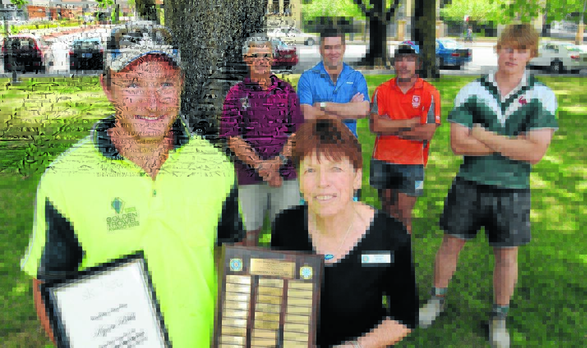 BUILDING A REPUTATION: Scholarship winner Kyran Bubb with Country Women's Association Central Western Group president Margaret Brown and (back) his employer David Cooper, Skillset business consultant Ben Ruddy, colleagues Joel Goff and Blake Hutchinson during yesterdays award presentation. Photo: STEVE GOSCH 1202sgcwa