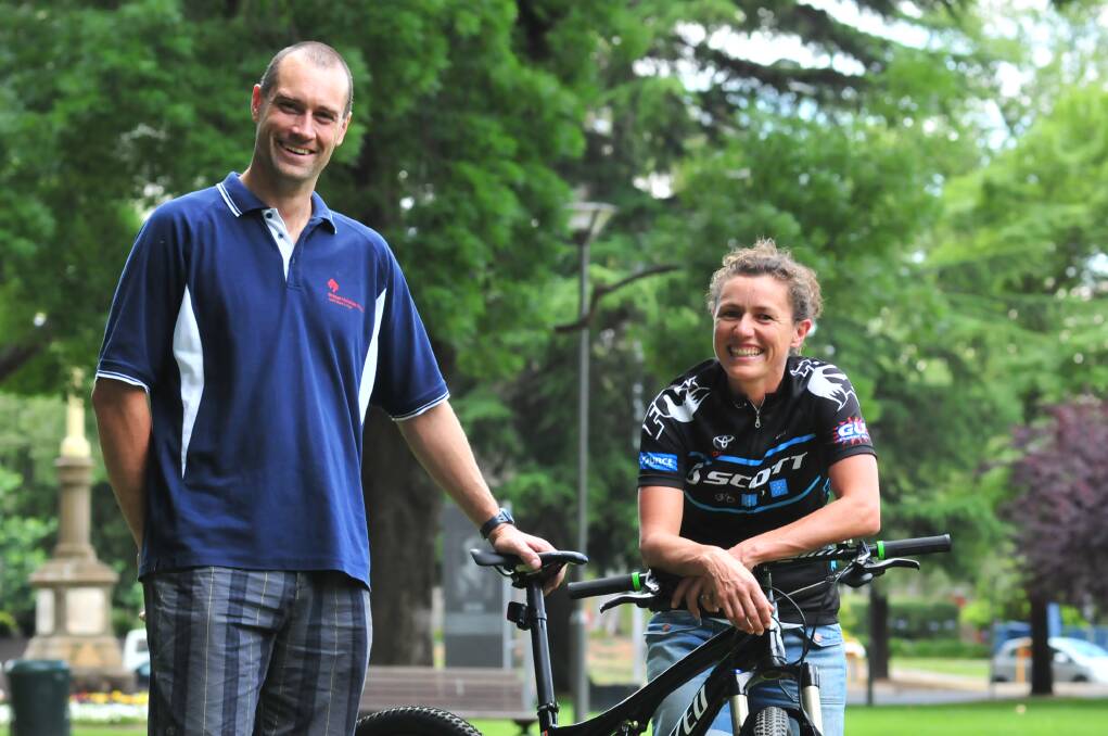 IN HOT FORM: Orange mountain bike riders Matt Cordery and Janet Martin were thrilled with their performance in Newcastle. Photo: JUDE KEOGH                              1128bikes2