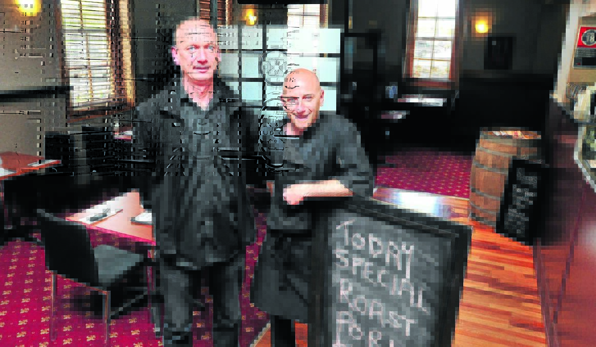 EARLY BIRDS: Occidental Hotel licensee Don Sholte and chef John Jenner will ramp up the pub’s restaurant in light of a decision to close the pub at midnight. Photo: JUDE KEOGH 0508oxo