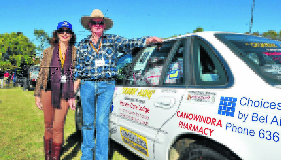 RALLYING TO THE CAUSE: Barbara Cooke and Gary Cooper left Orange yesterday in a car rally to help people undergoing treatment for cancer. Ms Cooke is doing the rally for her sister. Photo: JUDE KEOGH 					0503cruise1