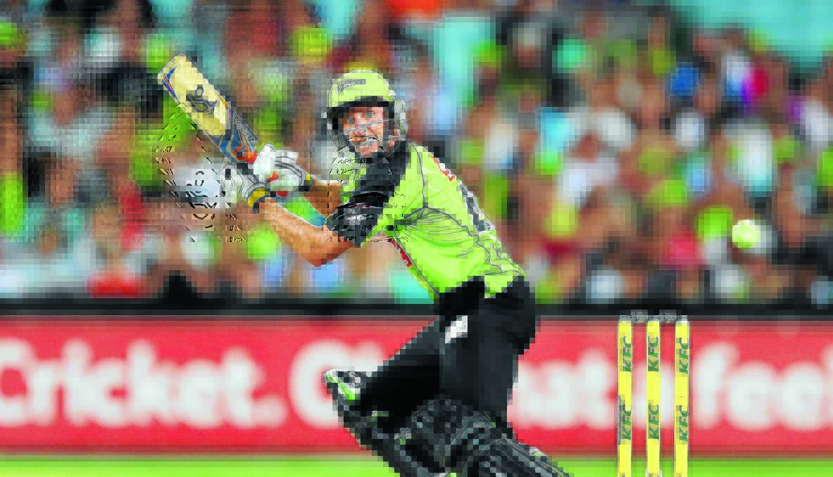 NICE KNOCK: The Thunder's Mike Hussey plays a fine glance on his way to a half-century against the Melbourne Stars in Wednesday's Big Bash League match. Photo: GETTY IMAGES