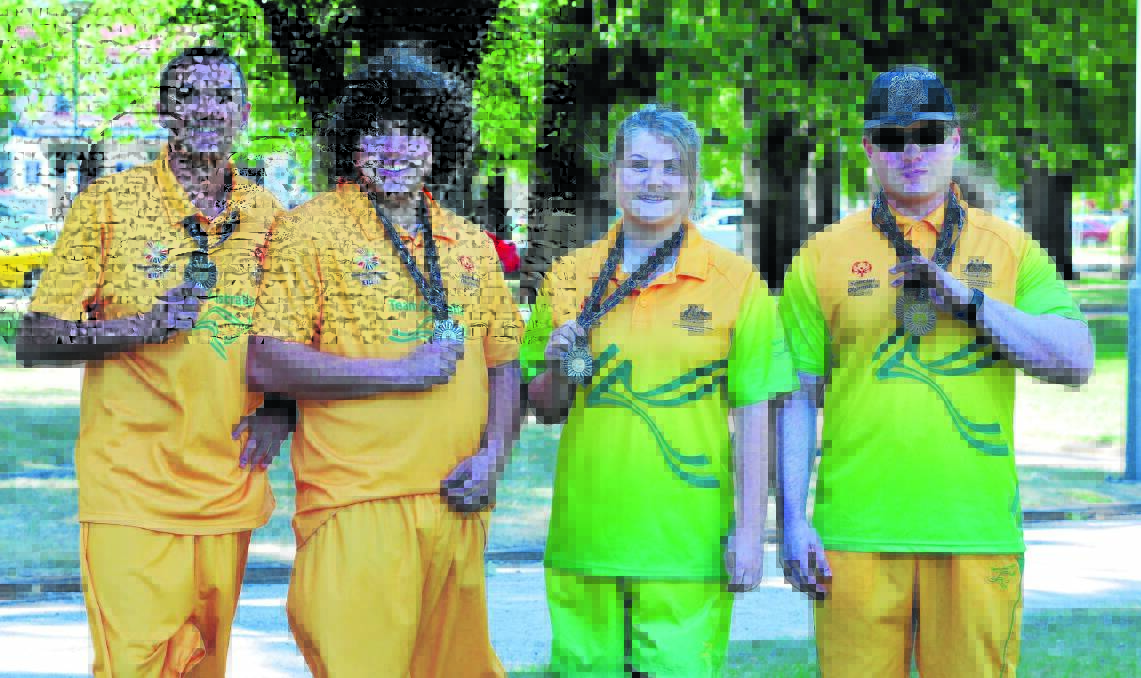 DREAM TEAM: Dean Pallier, Keelan Crawford, Siena Boland and Luke Rout all brought home medals from the Special Olympics Asia Pacific Games. Photo: JUDE KEOGH 1211olympics1