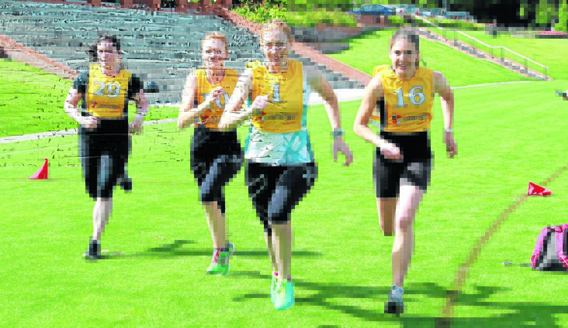 FAST FEET: Melissa Johnston (left), Carrie Williamson, Nicole Williamson and Belinda Ferguson set a hot pace in the 400 metres.  Photo: JEFF DEATH 1117jdkingsport01