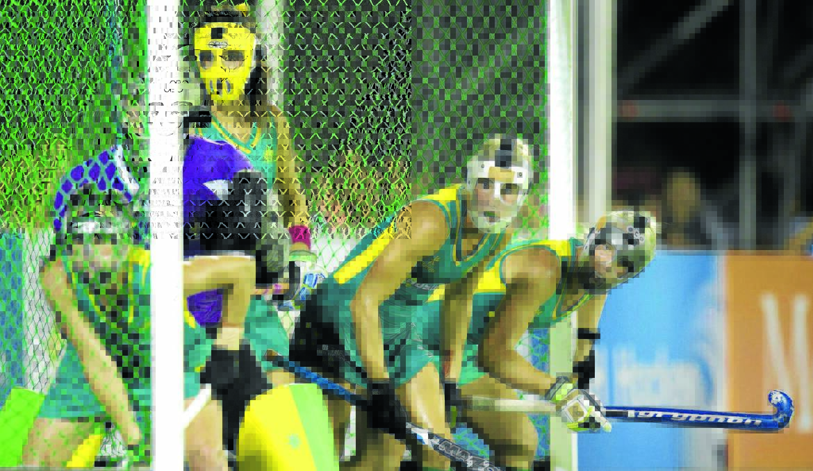 FINAL CHANCE: Edwina Bone (right) prepares for a short corner with the Hockeyroos in the World League final against the Netherlands. Photo: FRANK UIJLENBROEK