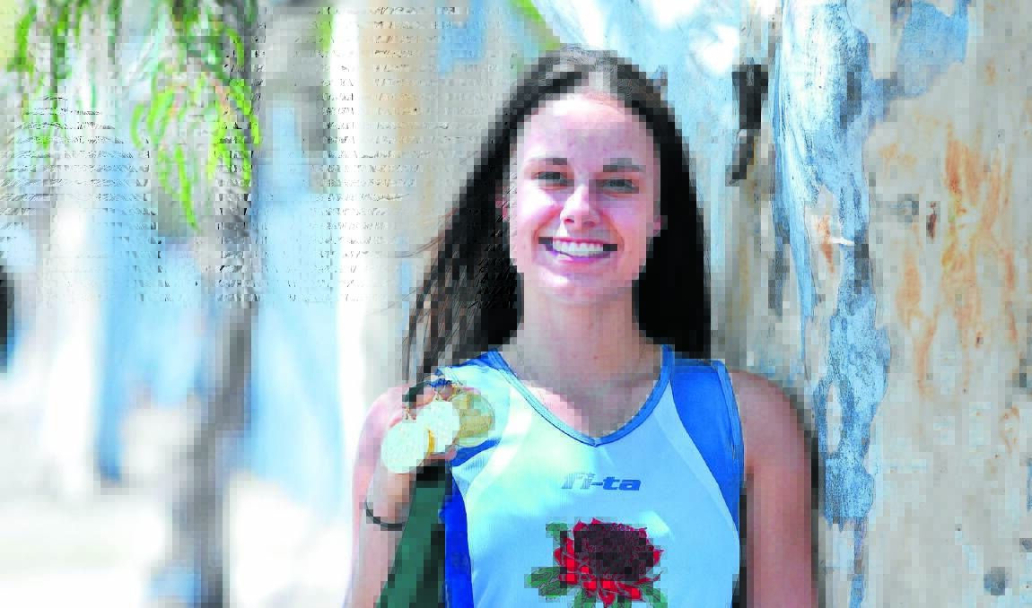 DUAL-CHAMPION: Rachel Divall has had a huge month, leading NSW to indoor hockey national championships in both the under 18s and 21s age groups, and was player of the tournament in the under 18s. Photo JUDE KEOGH 0129divall4