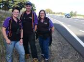 Jackie Clark, Luke Sweet and Louise O'Brien from Petcare Extraordinaire are pleased that work has commenced on the Mitchell HIghway near their work. Picture by Jude Keogh