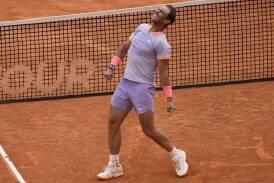 Rafael Nadal shows his relief and delight after beating Pedro Cachin in the Madrid Open. (AP PHOTO)