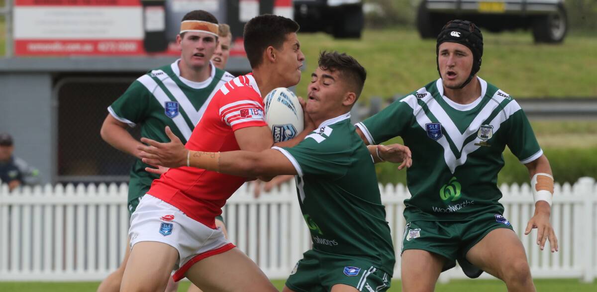 HARD YARDS: Western Rams halfback Jamie Thorpe looks to make the tackle in their loss to the Illawarra Dragons on Sunday. Photo: ROBERT PEET. 