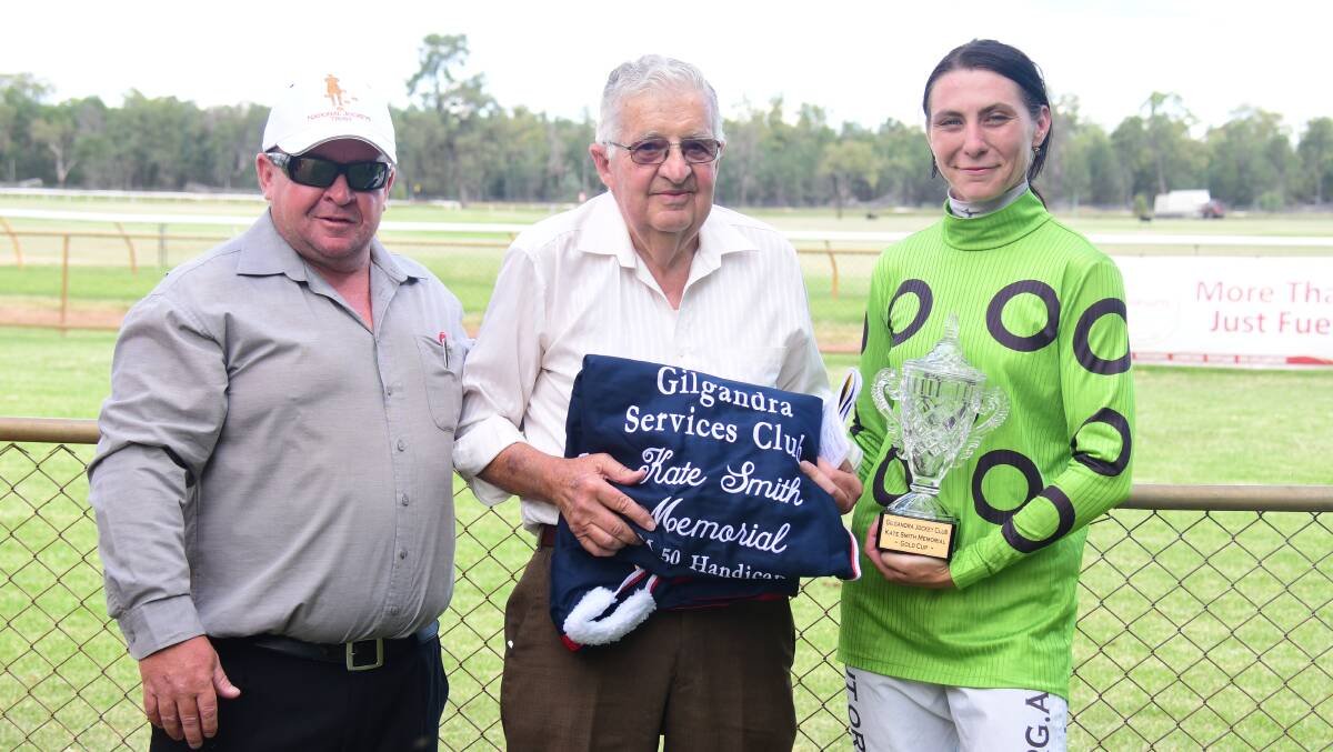 DESERVING: Gilgandra Jockey Club's Jason Tate, John Smith and Chelsea Ings with the Kate Smith Memorial trophy. Picture: AMY MCINTYRE