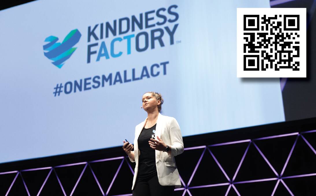 One small act: Scanning the KR - Kindness Response - code will prompt an act of kindness. Pictured Kath Koschel at a Kindness Factory event. Photo: Supplied
