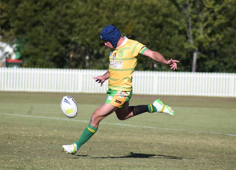 Daniel Mortimer kicks the ball during Orange CYMS round one clash with Mudgee Dragons. Picture by Jude Keogh