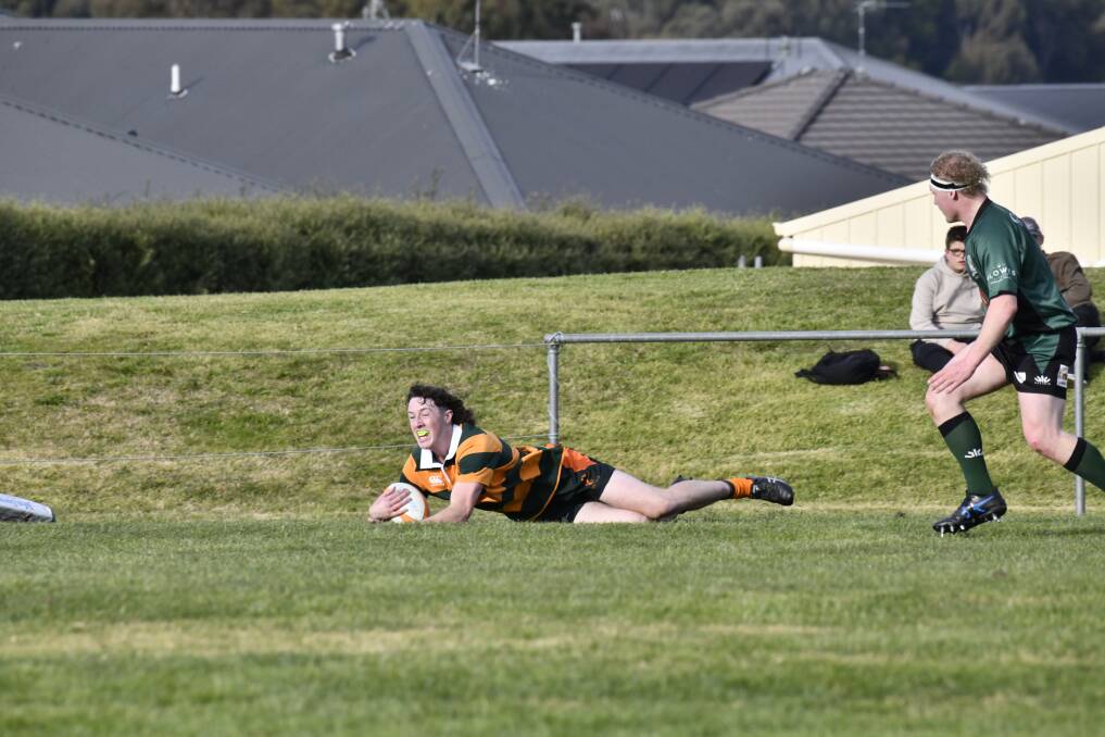 Cahrlie Sutton goes in for the second try of the afternoon. Picture by Jude Keogh