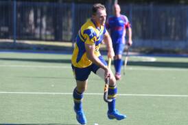 X-Men's Daryl Kennewell looks for a pass in the final against Feds. Picture by Jude Keogh