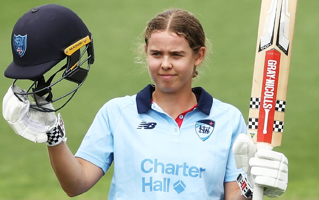 Phoebe Litchfield celebrates notching her first WNCL century during the NSW Breakers' victory over Western Australia. Picture by Getty Images/Matt King.