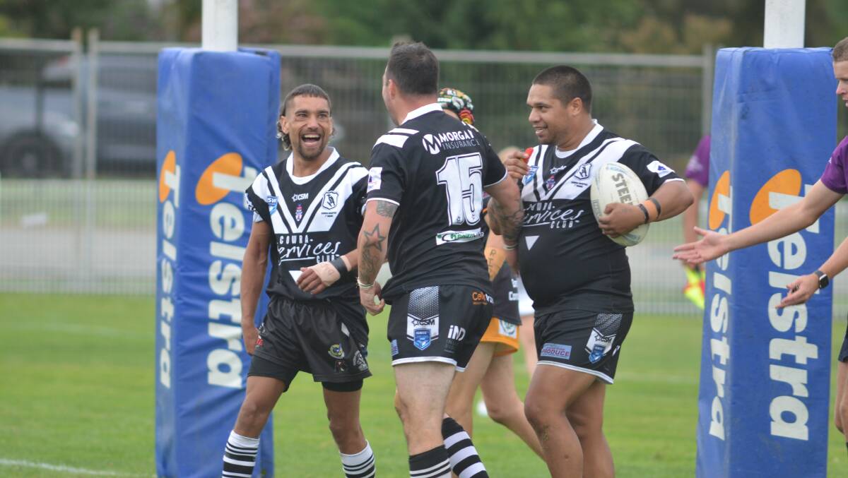 Cowra Magpies players celebrate a try. Picture by Dominic Unwin