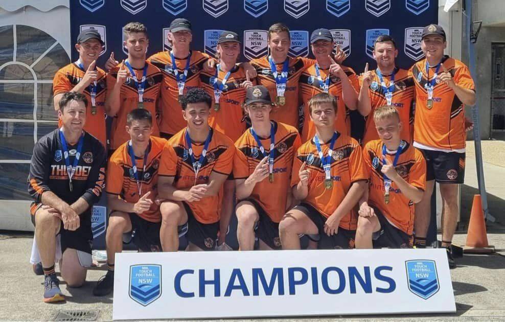 Wayne Hill (bottom left) pictured with the victorious Mens 20s Orange Thunder side at the 2022 NSW Touch Football State Cup. Picture supplied (Facebook)