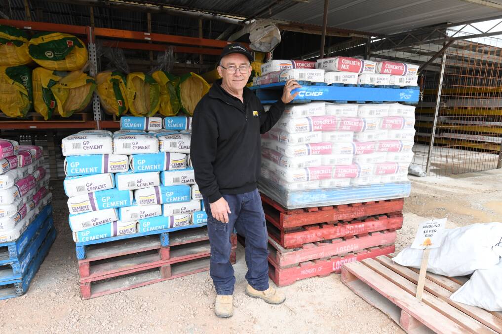Molong H Hardware manager Steve McMillan is taking no chnaces, stacking prodcuts as high as he can. Picture by Jude Keogh