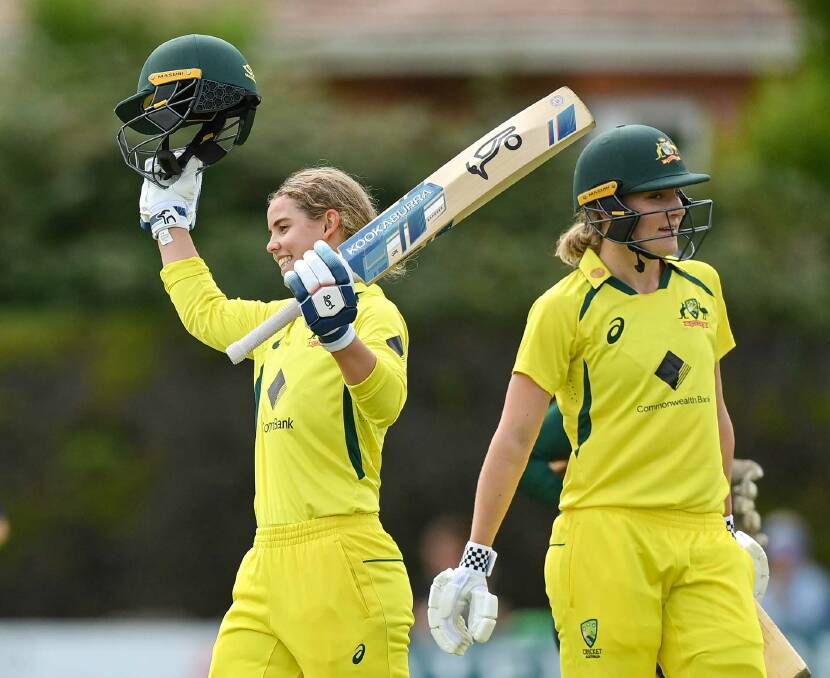 Orange cricketer Phoebe Litchfield celebrates her maiden ODI century for Australia. Picture by Australan Women's Cricket Team