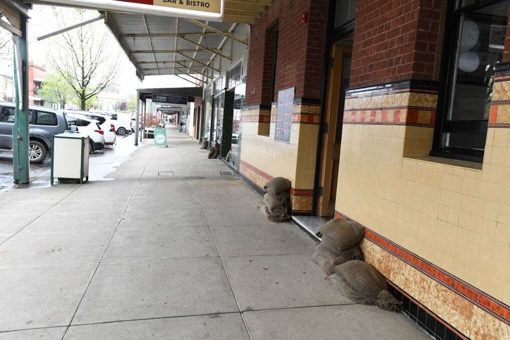 Sandbags in front of the Freemasons Hotel in Molong. Picture by Jude Keogh