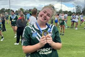 Lilly Baker with her winners medal after the 2024 Women's Country Championships grand final. Picture supplied