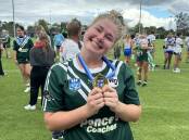 Lilly Baker with her winners medal after the 2024 Women's Country Championships grand final. Picture supplied