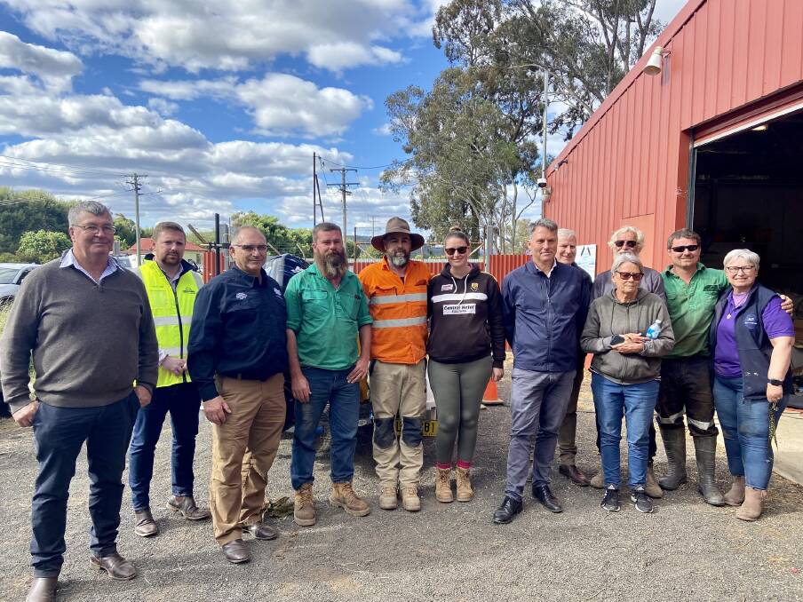 Cabonne Shire mayor Kevin Beatty (L), deputy Primer Minister Richard Marles (sixth from right) and Nationals MP Michael McCormack (fifth from right) in Eugowra. Picture by Cabonne Shire Council