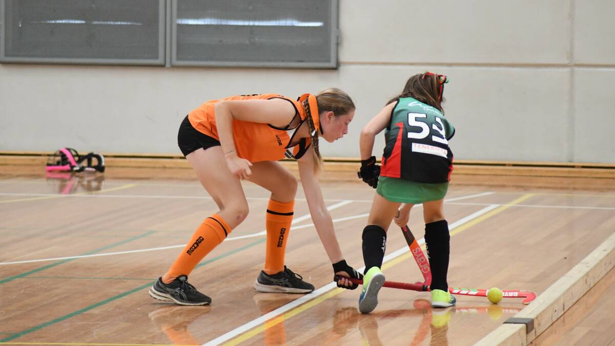 Orange takes on the best of NSW at Under 13s indoor hockey championships. Pictures by Carla Freedman and Jude Keogh