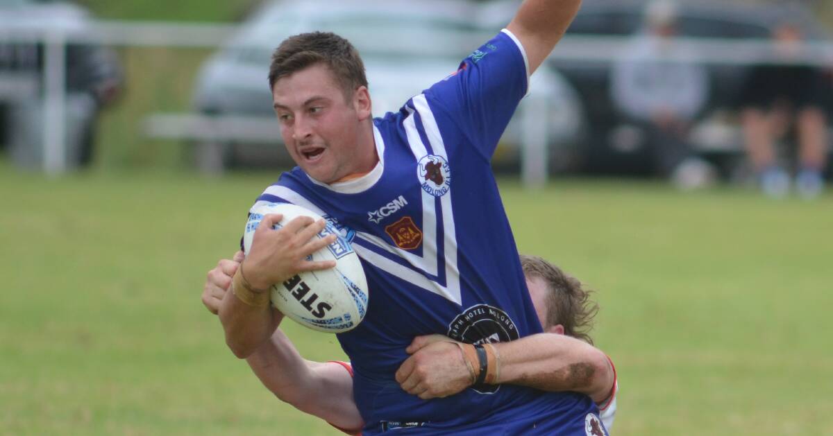 Ben Blimka is tackled during the round one match between Manildra Rhinos and Molong Bulls. Picture by Dominic Unwin