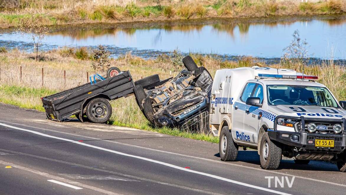 A car towing a trailer rolled onto its roof on the Northern Distributor in 2021. Picture by Troy Pearson
