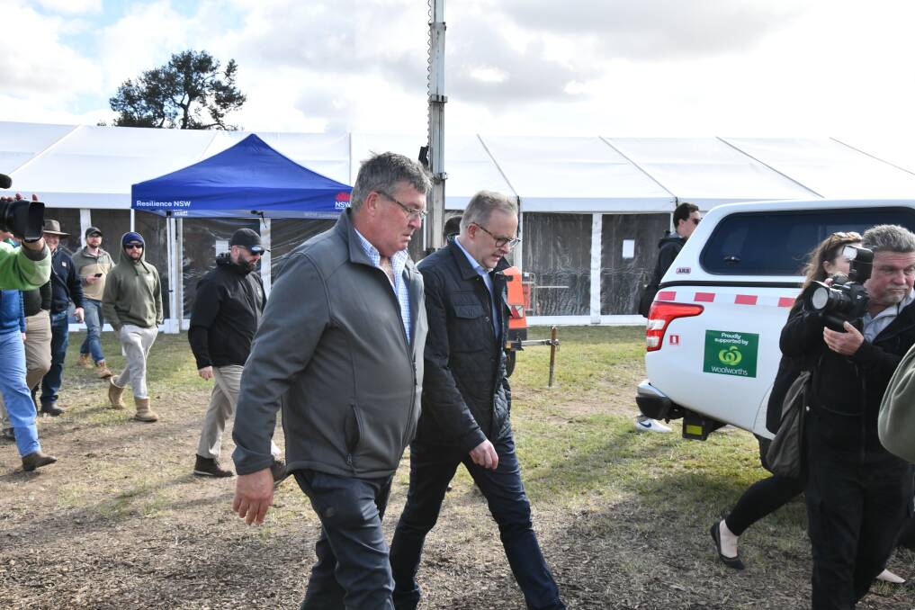 Cabonne Council mayor Kevin Beatty with Prime Minister Anthony Albanese during the Eugowra foods in 2022. Picture by Carla Freedman