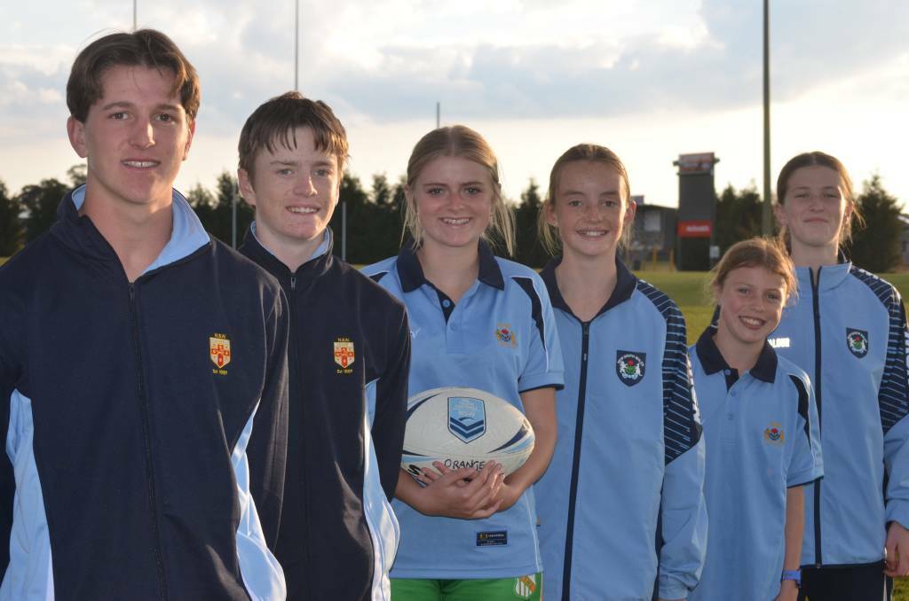 Orange Thunder players Taj Jordan, Sam Hill, Lucy Martin, Tess Hill, Mackenzie Thornberry-Ruddy and Clancy Simmons in their NSW touch football gear. Picture by Dominic Unwin