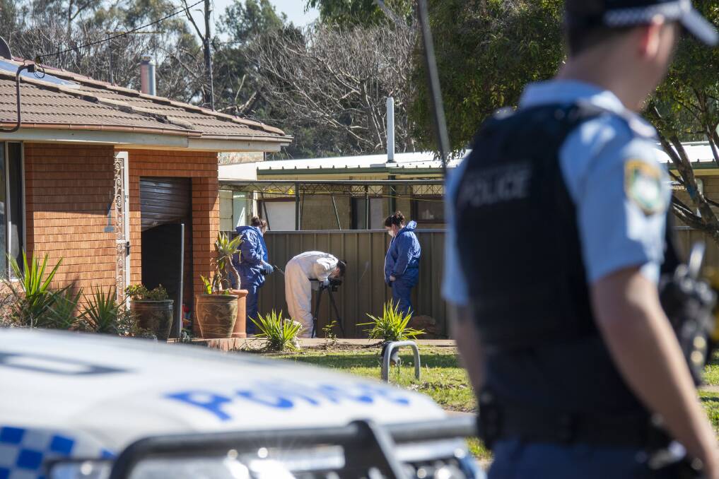 Police and forensics on scene at the house in Margaret Crescent where the murder allegedly took place. Picture by Belinda Soole
