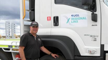 ALMIGHTY BOOST: Todd Raffen of Almighty Industries with one of UGL Regional Linx new vehicles which Mr Raffen's company is fitting for rail purposes. Photo CARLA FREEMAN.