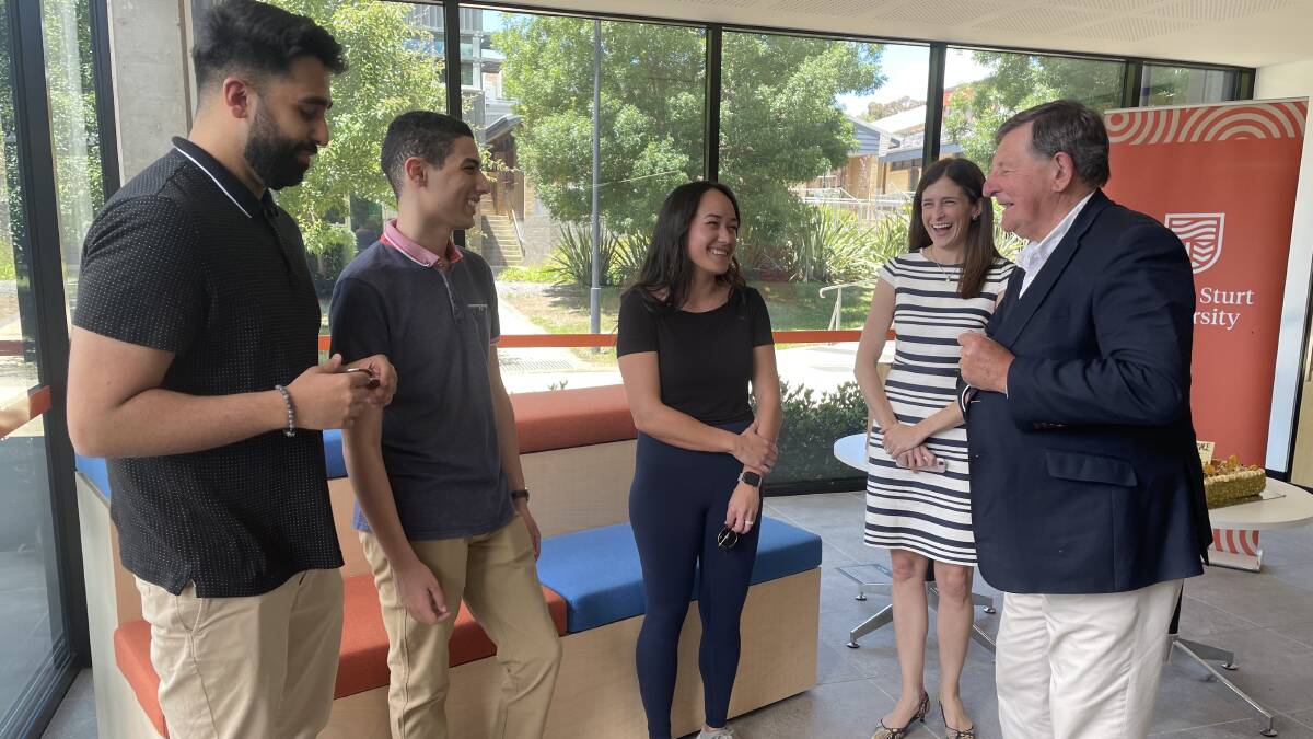 WELCOME BACK: Canadian students Gursahil Dhami, Mohamed Elsherbini and Elisa Cherry with Charles Sturt University's Director of Global Engagement Eleanor Mitchell and Orange mayor Reg Kidd.