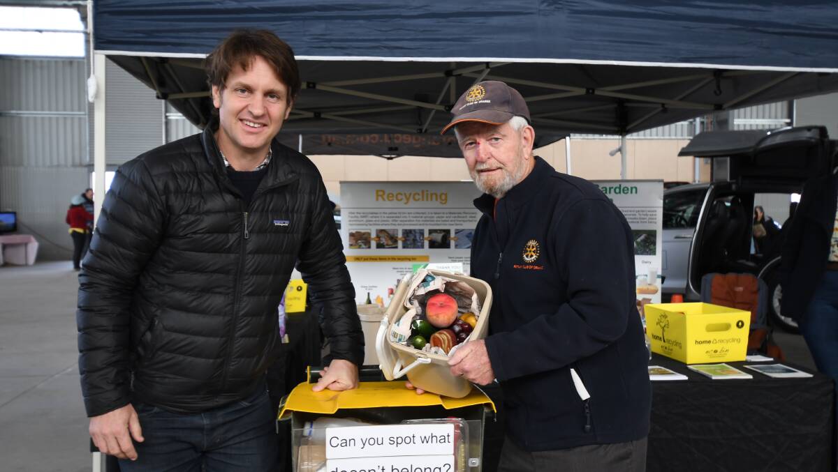 HOW'S YOUR BIN: ABC's War on Waste presenter Craig Reucassel with Rotary of Orange's John Mills at Sunday's Sustainable Living Expo. Photo CARLA FREEDMAN