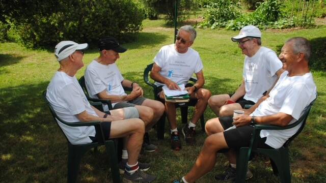 PLANNING: Brian Sharp, Brian Rix, John Moss, Basil Baldwin and Bill Fairgrieve prepare for this weekend's combined marathon attempt. Russell Tym was training elsewhere! Photo contributed