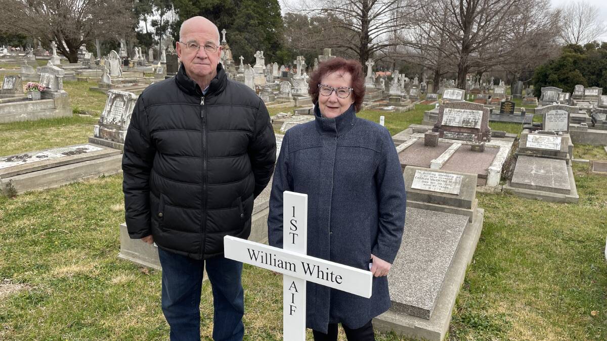 'THEY'RE LIKE FAMILY': RSL Orange subbranch president Chris Colvin and researcher Sharon Jameson at the grave marking of William White, which was one of over 90 unmarked World War 1 graves at the Orange Cemetery. Photo KATE BOWYER