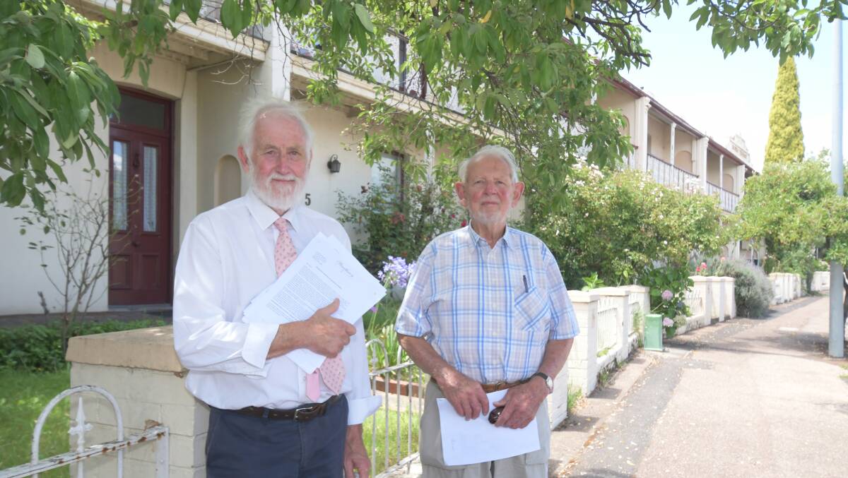 Unit owner Andrew McDougall and the Orange Heritage Group's Charles Everett outside Bowen Terrace. Photo JUDE KEOGH
