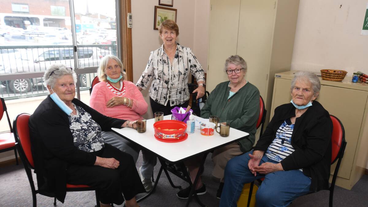 FELLOWSHIP: Combined Pensioners members Laurel Fowler, Isabel Thornberry, Margaret Sutton, Barbara Russell and Betty Barnes catch up before lunch at the Senior Citizens Centre. Photo JUDE KEOGH
