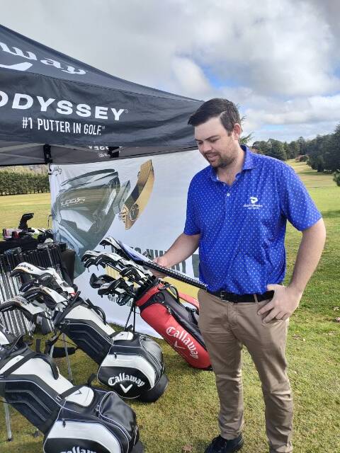TEEING UP SUPPORT: Club professional Nathan King checks the draw for Friday's Bruce McLean Golf Day at Duntryleague. Photo contributed