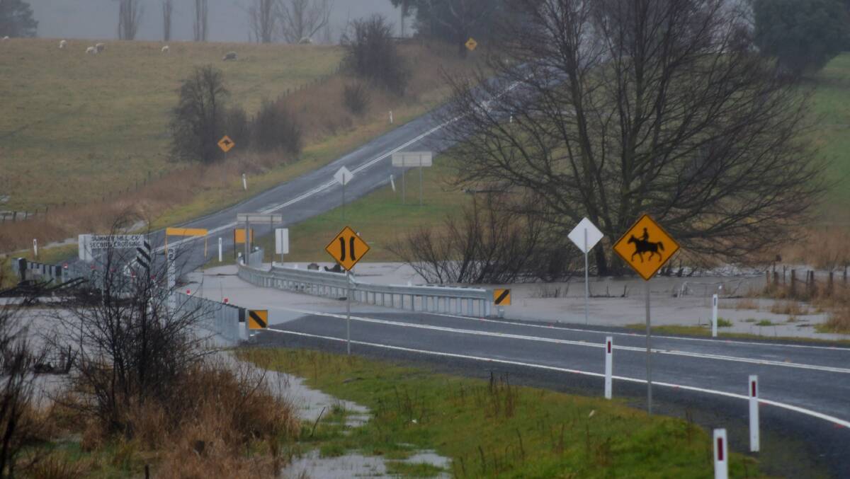 CLOSED: The second crossing on Ophir Road was flooded on Thursday afternoon. Photo CARLA FREEDMAN