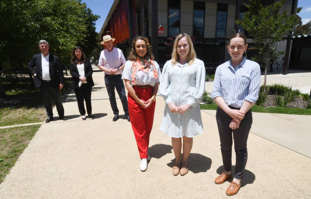 Minister for Regional Health Dr David Gillespie, CSU Dean of Rural Medical School Lesley Forster, Member for Calare Andrew Gee, Heidi Annand from Bathurst, Chloe Campbell (Bombala) and Miranda Eyb (Cudal). Photo JUDE KEOGH