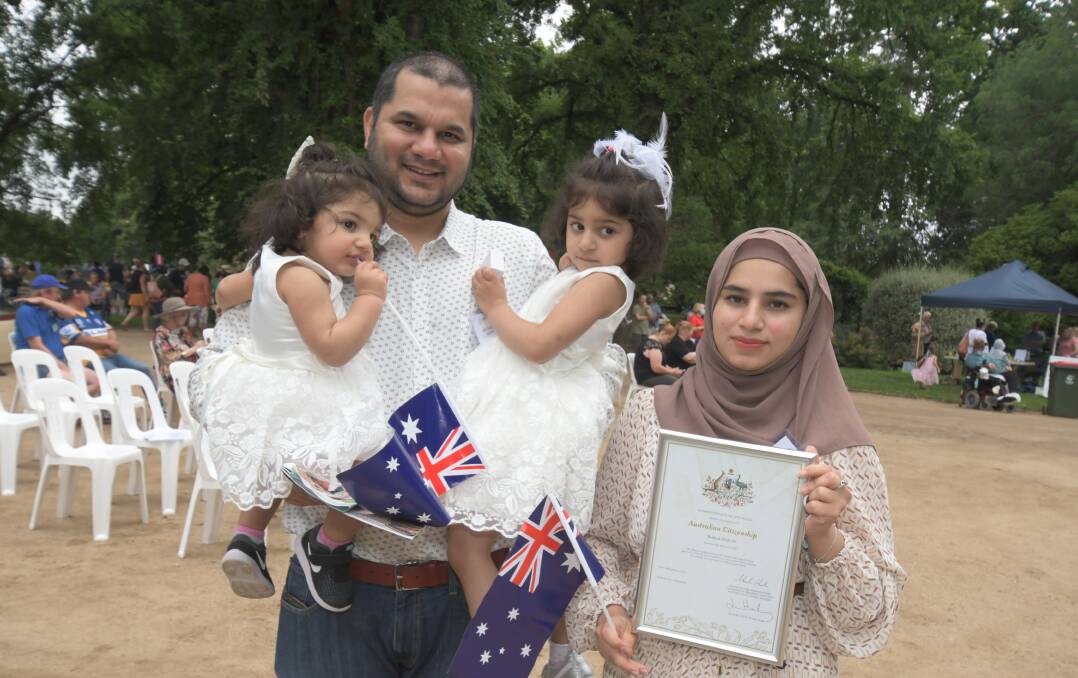 Shakeel Anjum and Iqra Jabeen and their daughers Minsa and Mirha Shakeel became Australia citizens yesterday. Photo JUDE KEOGH