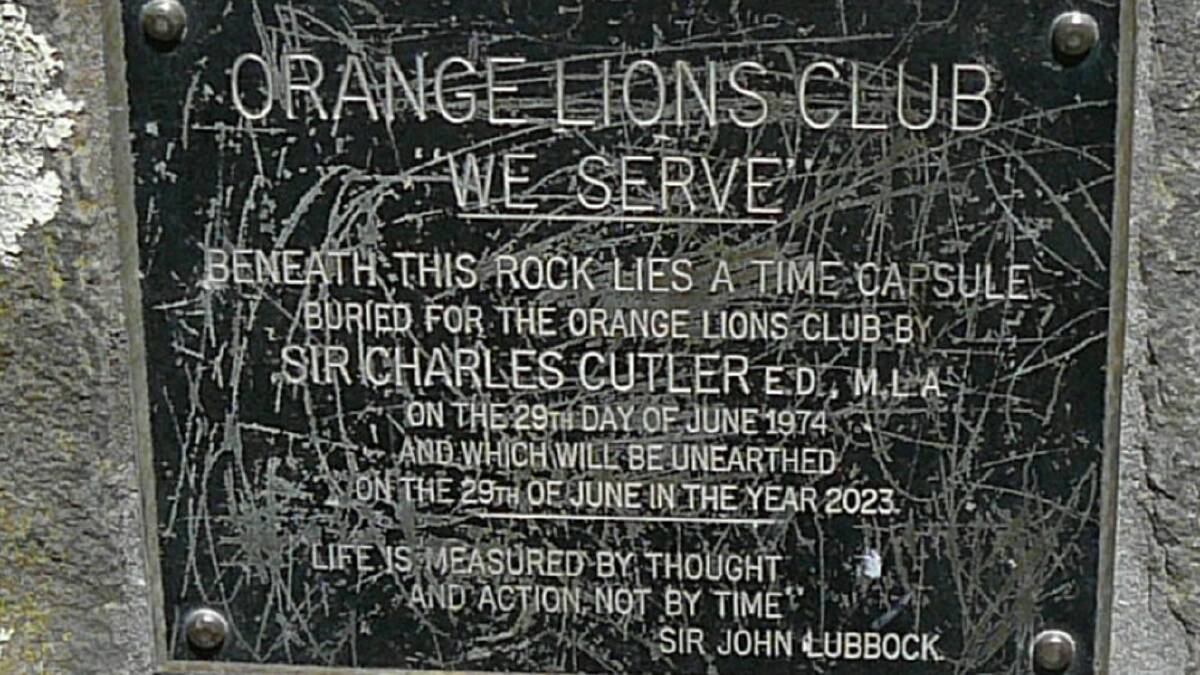 OPENING INSTRUCTION: The plaque on the rock marking the burial place of the Lions 1974 time capsule.