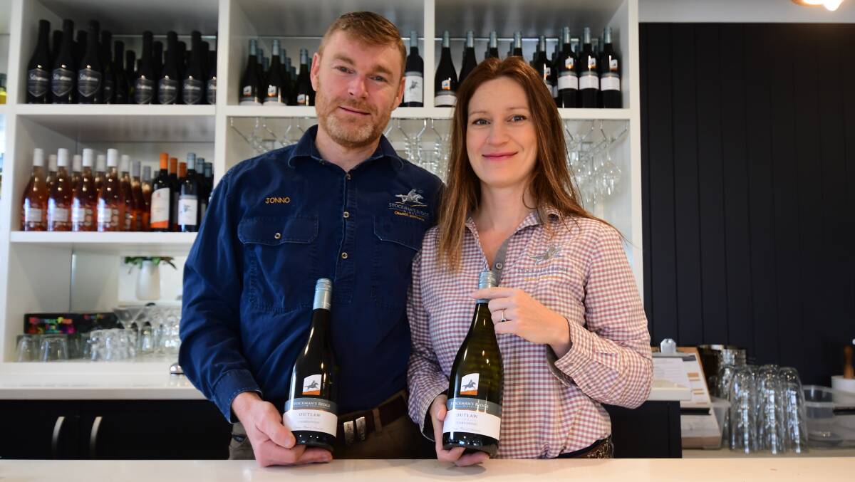 Jon Hambrook and Lisa De Diana of Stockman's Ridge winery, with their award-winning 2016 Chardonnay. Photo CARLA FREEDMAN