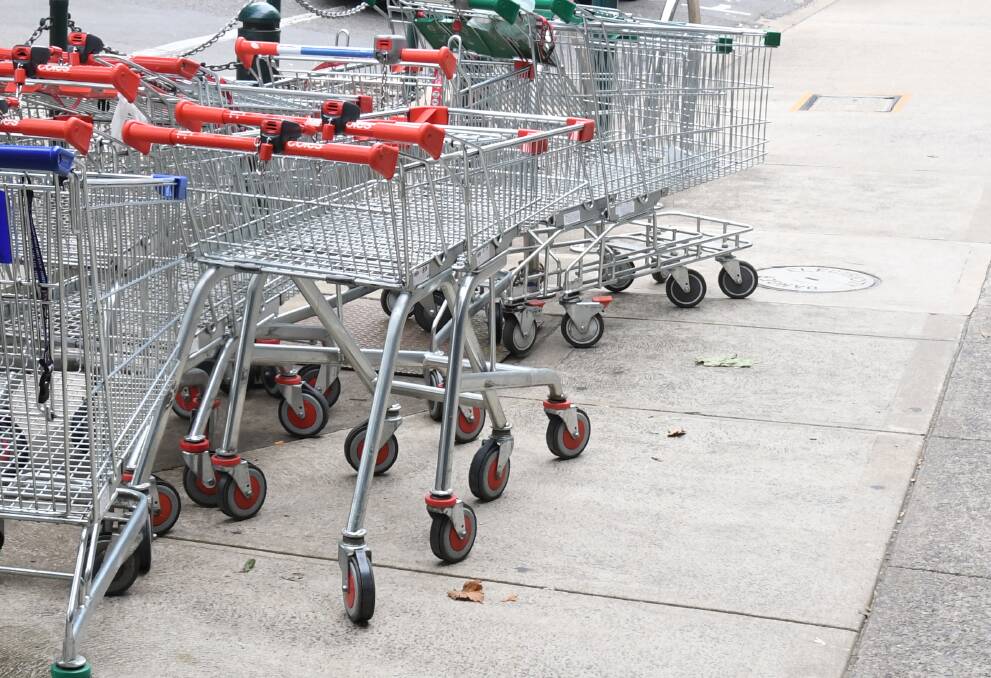 COLLECTION CONCERN: A north Orange resident doesn't believe Woolworth's staff should have to collect trolleys from the supermarket's car park.