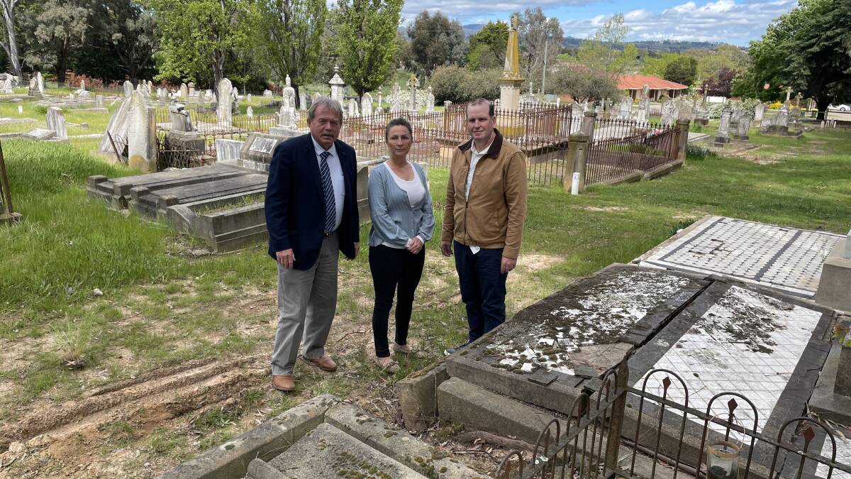CONCERN: Kevin Duffy, Mandy Moore and Graeme Judge would like to see the historical part of the Orange cemetery restored. Photo: KATE BOWYER.