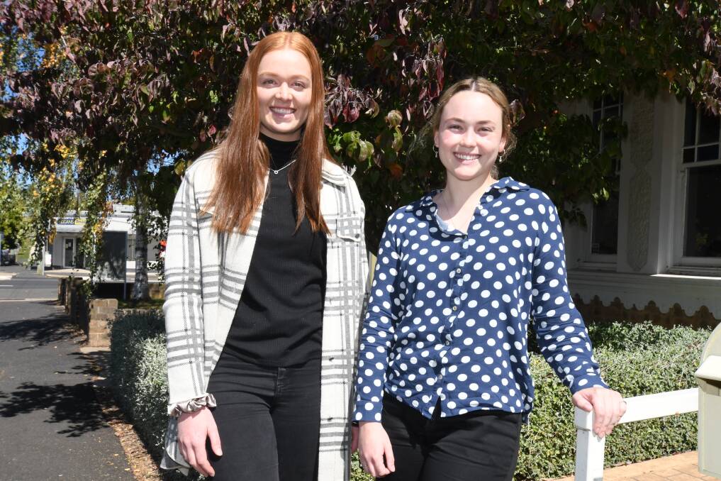 JUMPING STRAIGHT IN: Newly graduated psychologists at Orange's Health in Mind service, Isabel Harris and Erin Cobcroft will each skydive out of planes to raise money for those in crisis across the region. Photo: JUDE KEOGH.
